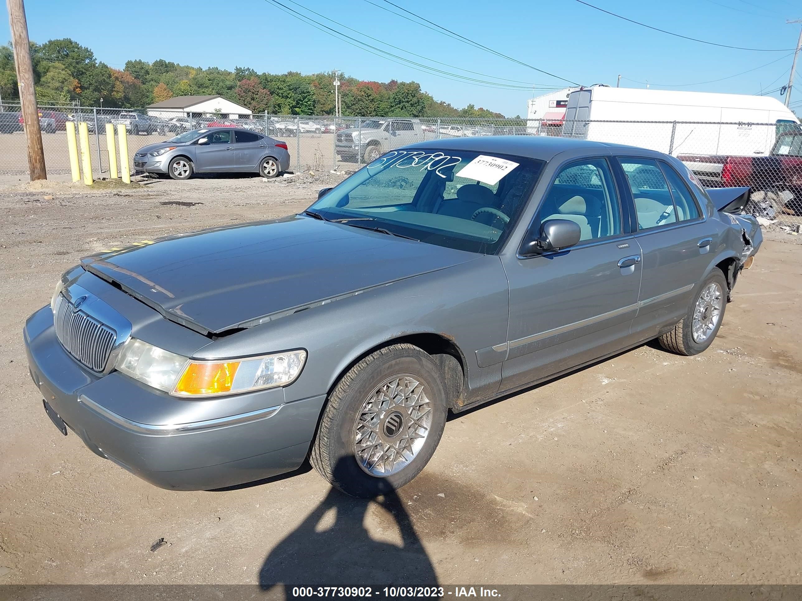 Photo 1 VIN: 2MEFM74W9XX711454 - MERCURY GRAND MARQUIS 