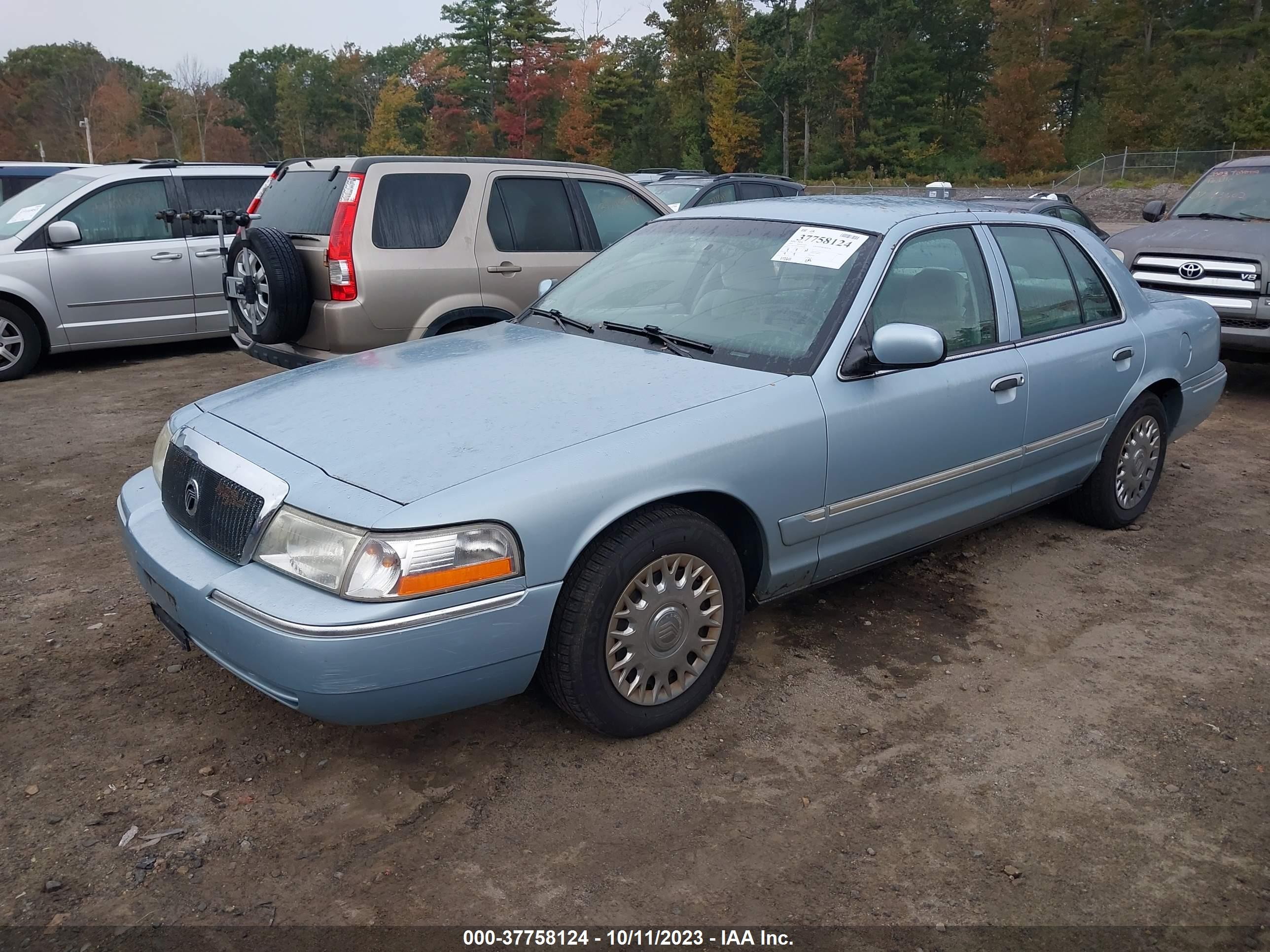 Photo 1 VIN: 2MEFM74WX3X696585 - MERCURY GRAND MARQUIS 