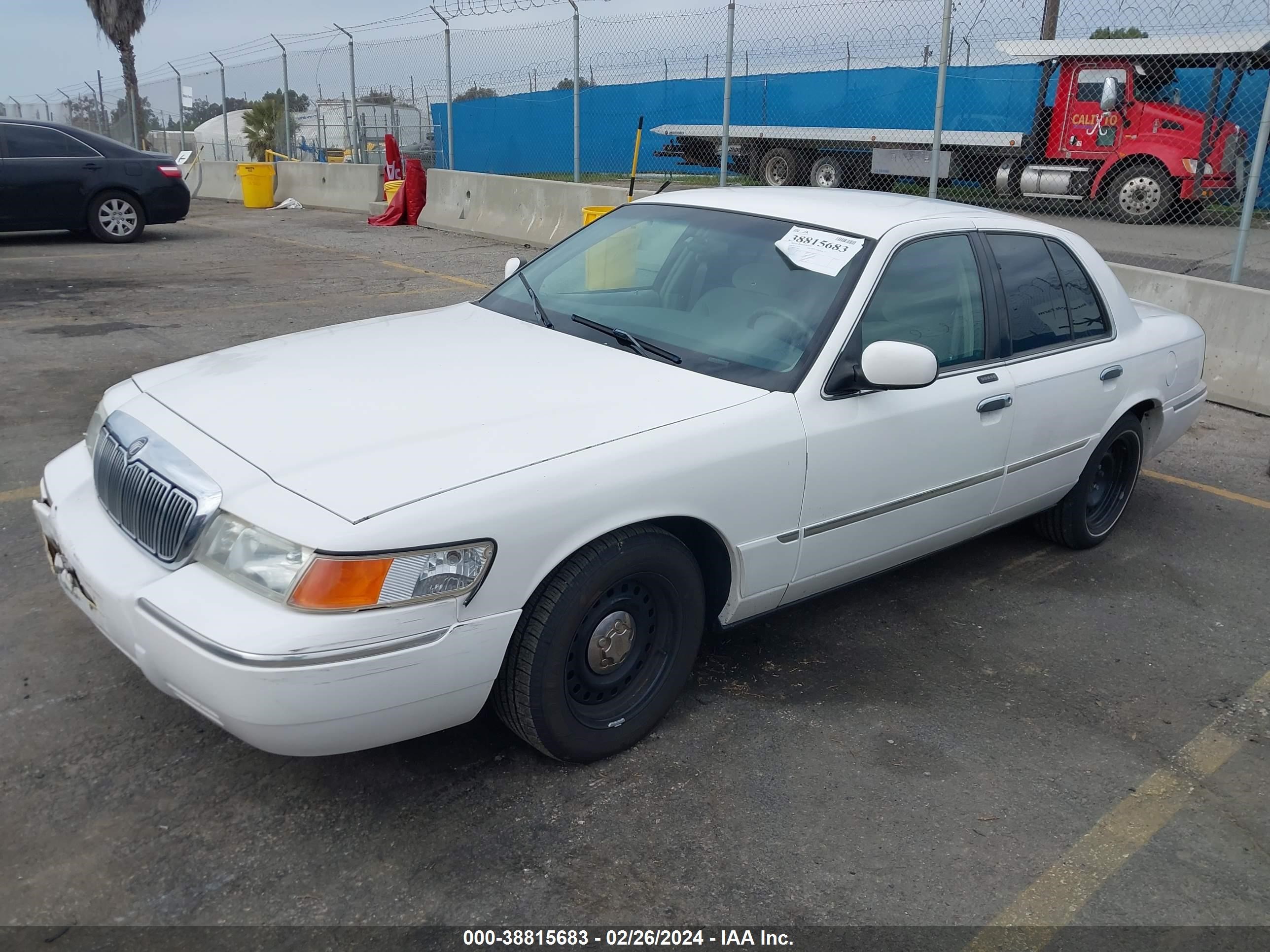 Photo 1 VIN: 2MEFM75W0XX671490 - MERCURY GRAND MARQUIS 