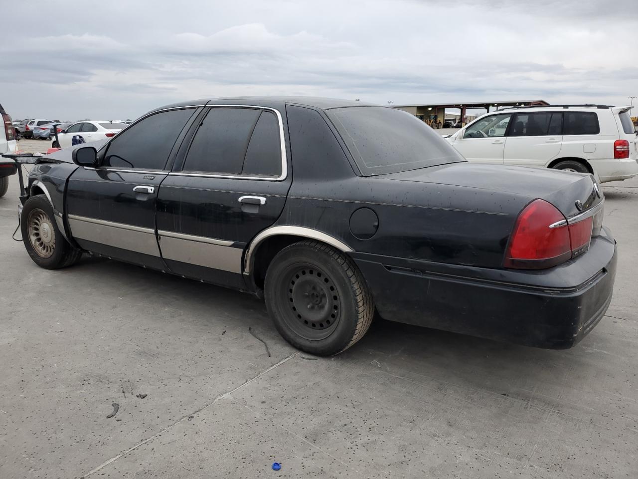 Photo 1 VIN: 2MEFM75W0XX704911 - MERCURY GRAND MARQUIS 