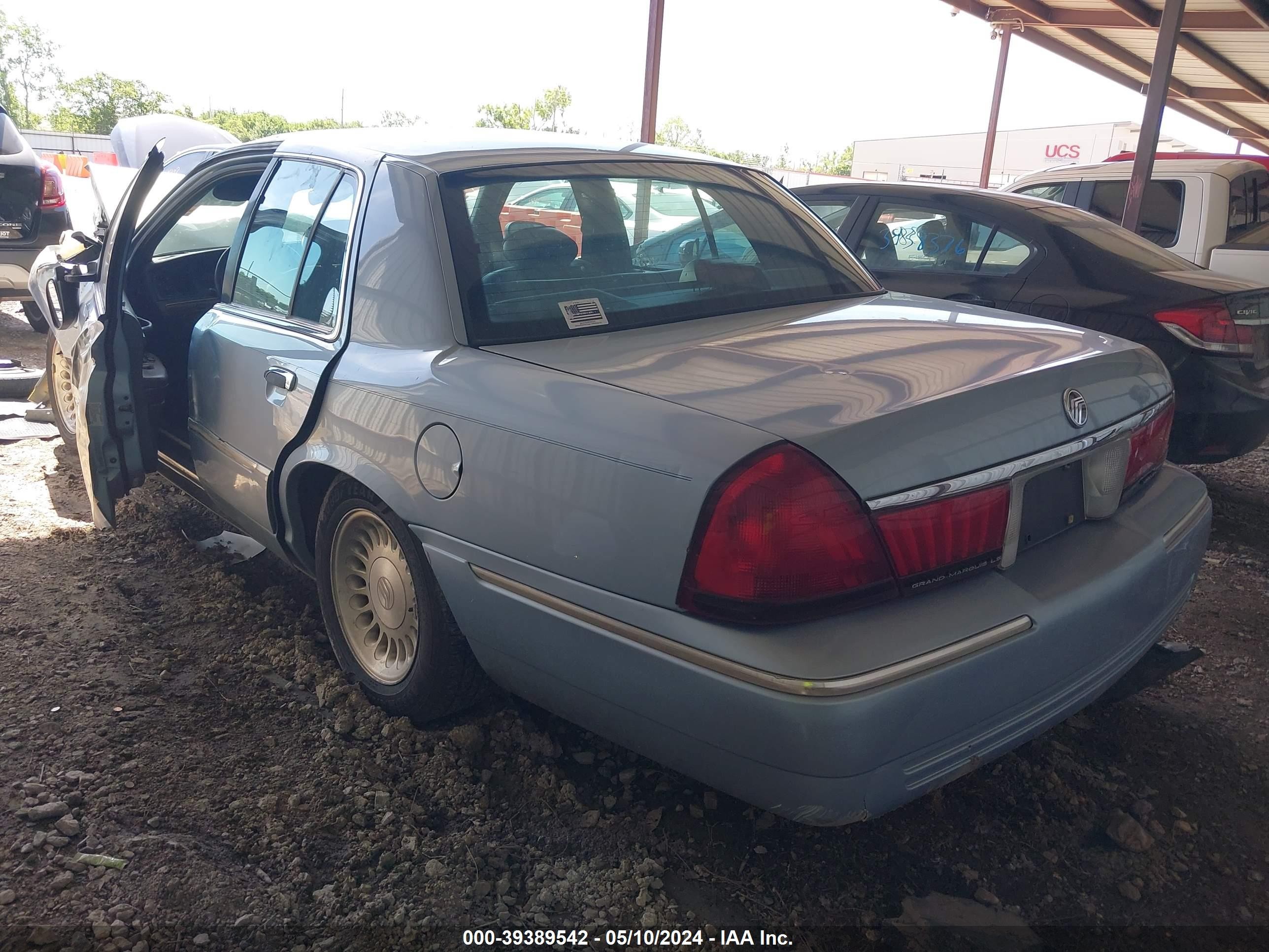 Photo 2 VIN: 2MEFM75W4XX649265 - MERCURY GRAND MARQUIS 