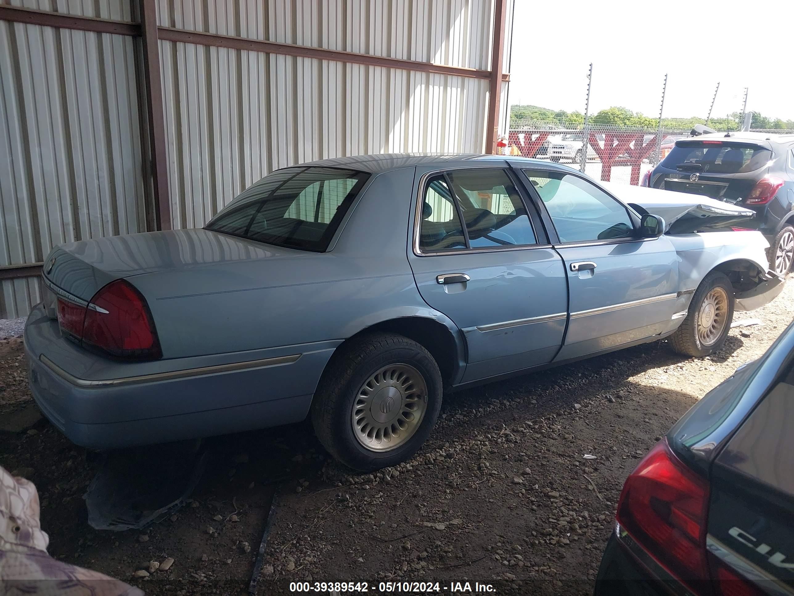 Photo 3 VIN: 2MEFM75W4XX649265 - MERCURY GRAND MARQUIS 