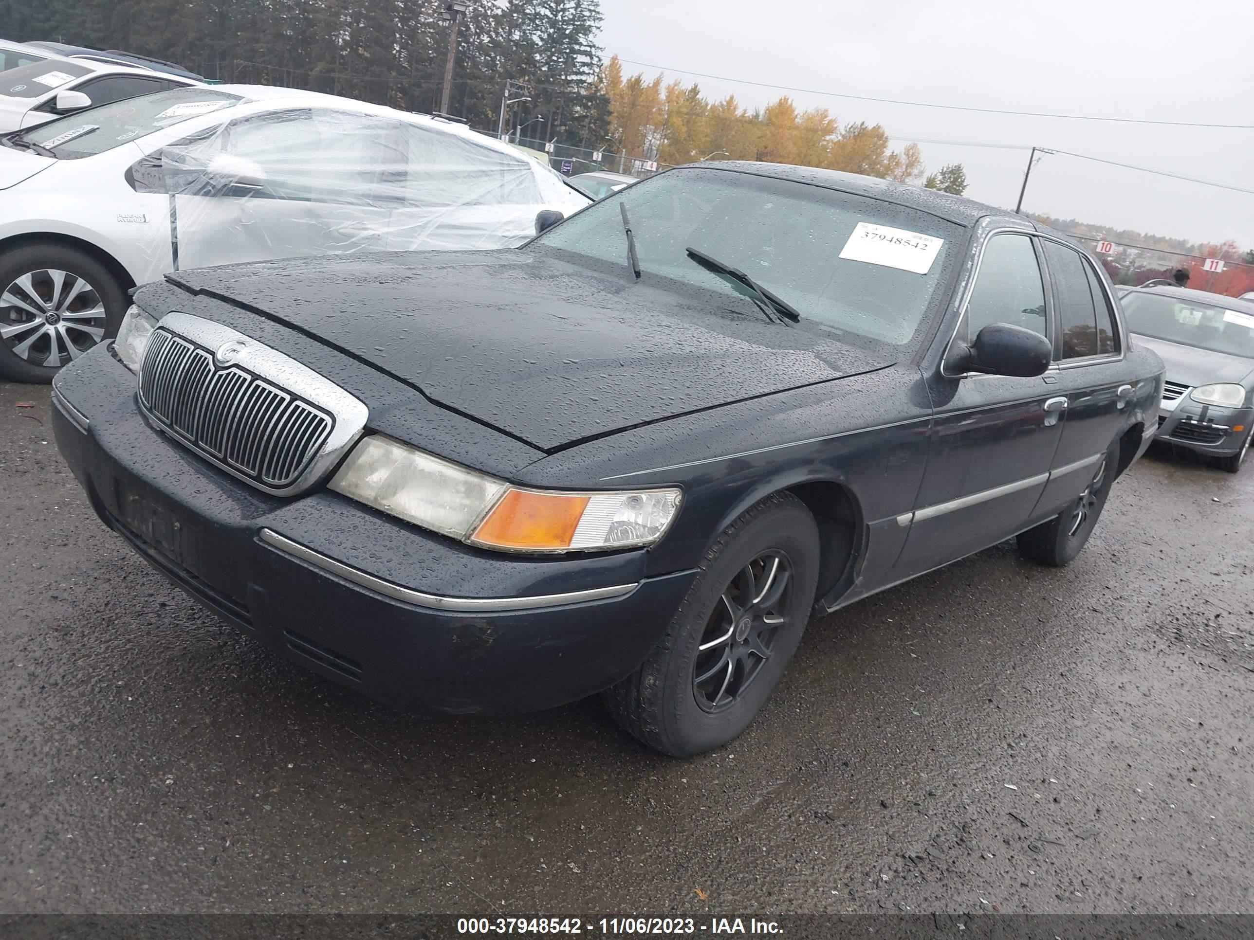 Photo 1 VIN: 2MEFM75W4YX719784 - MERCURY GRAND MARQUIS 