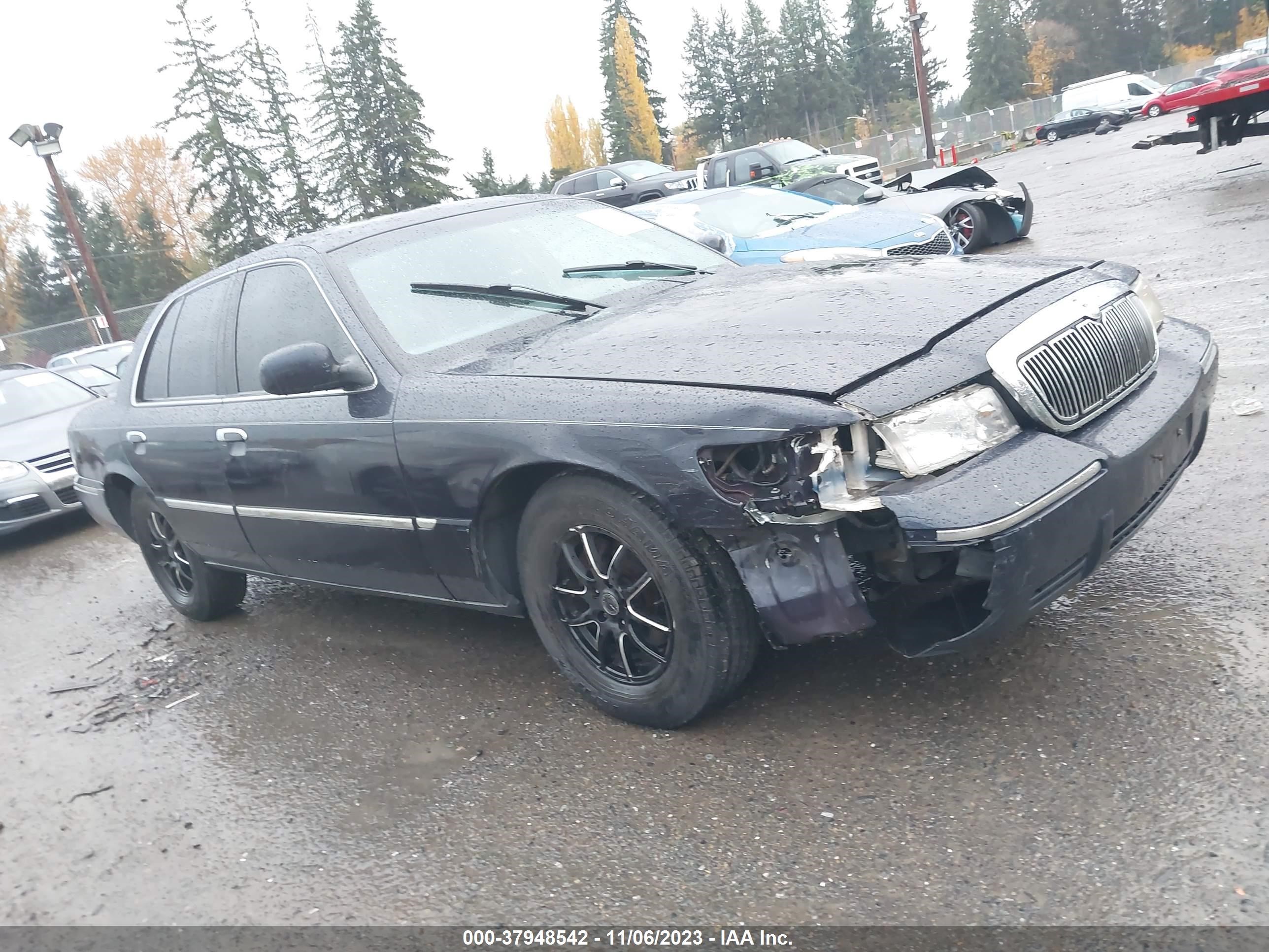 Photo 12 VIN: 2MEFM75W4YX719784 - MERCURY GRAND MARQUIS 