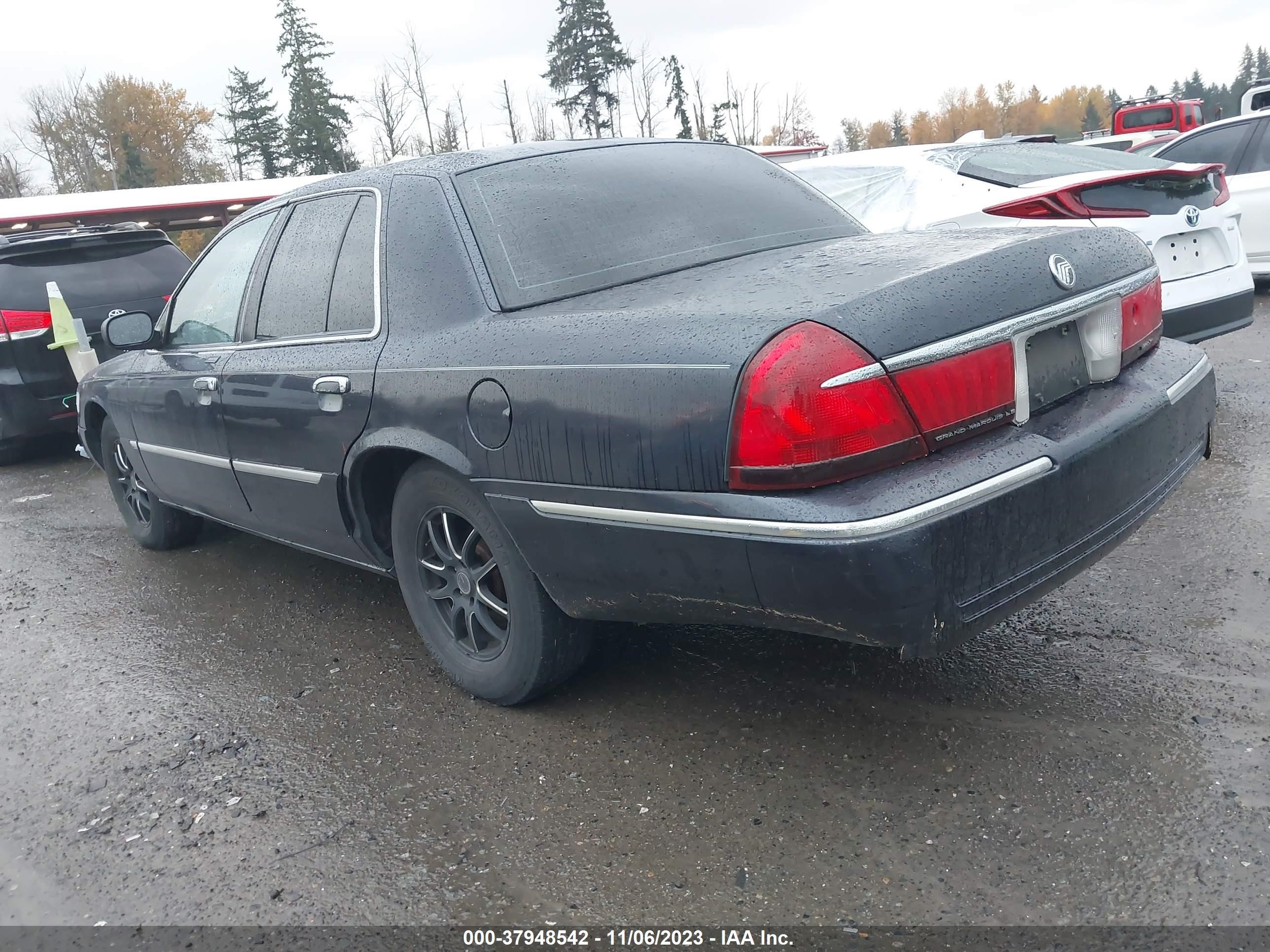 Photo 13 VIN: 2MEFM75W4YX719784 - MERCURY GRAND MARQUIS 