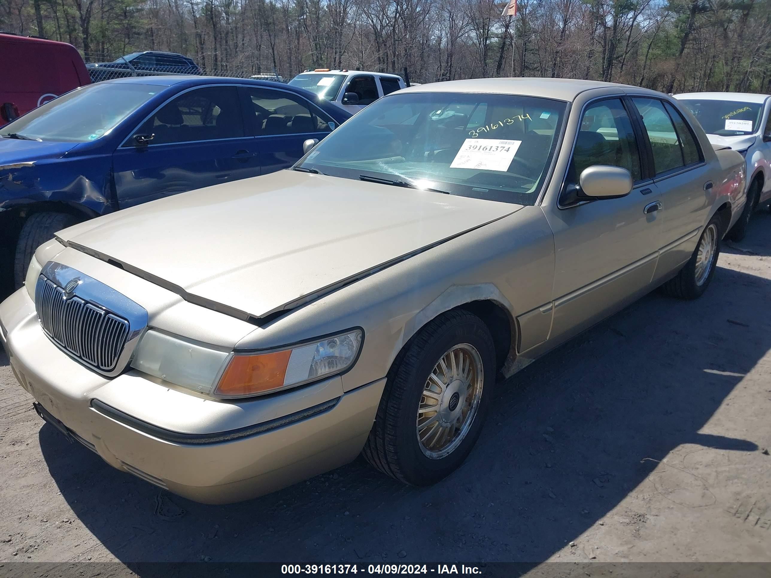 Photo 1 VIN: 2MEFM75W8XX719737 - MERCURY GRAND MARQUIS 