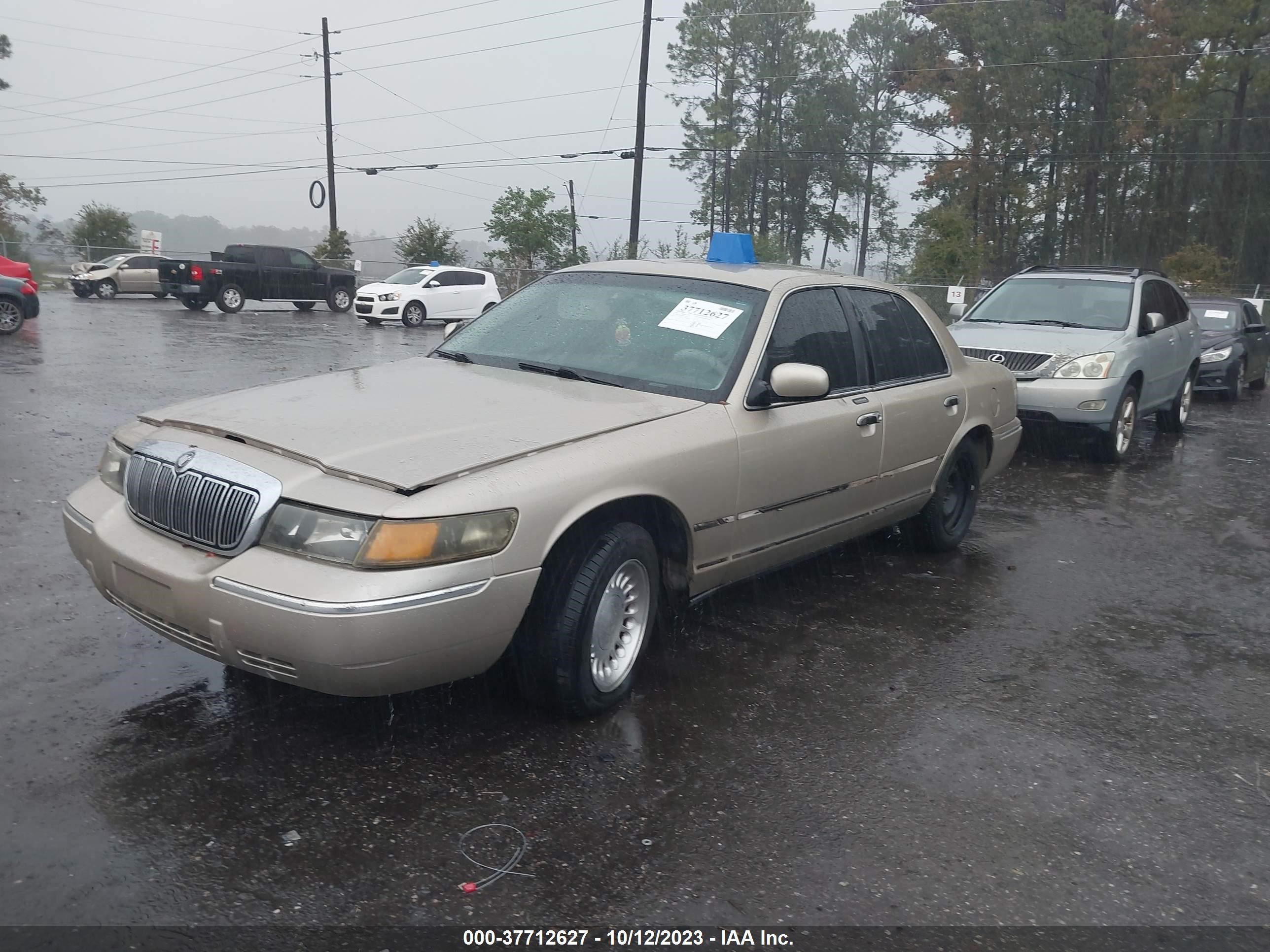 Photo 1 VIN: 2MEFM75W8XX728275 - MERCURY GRAND MARQUIS 