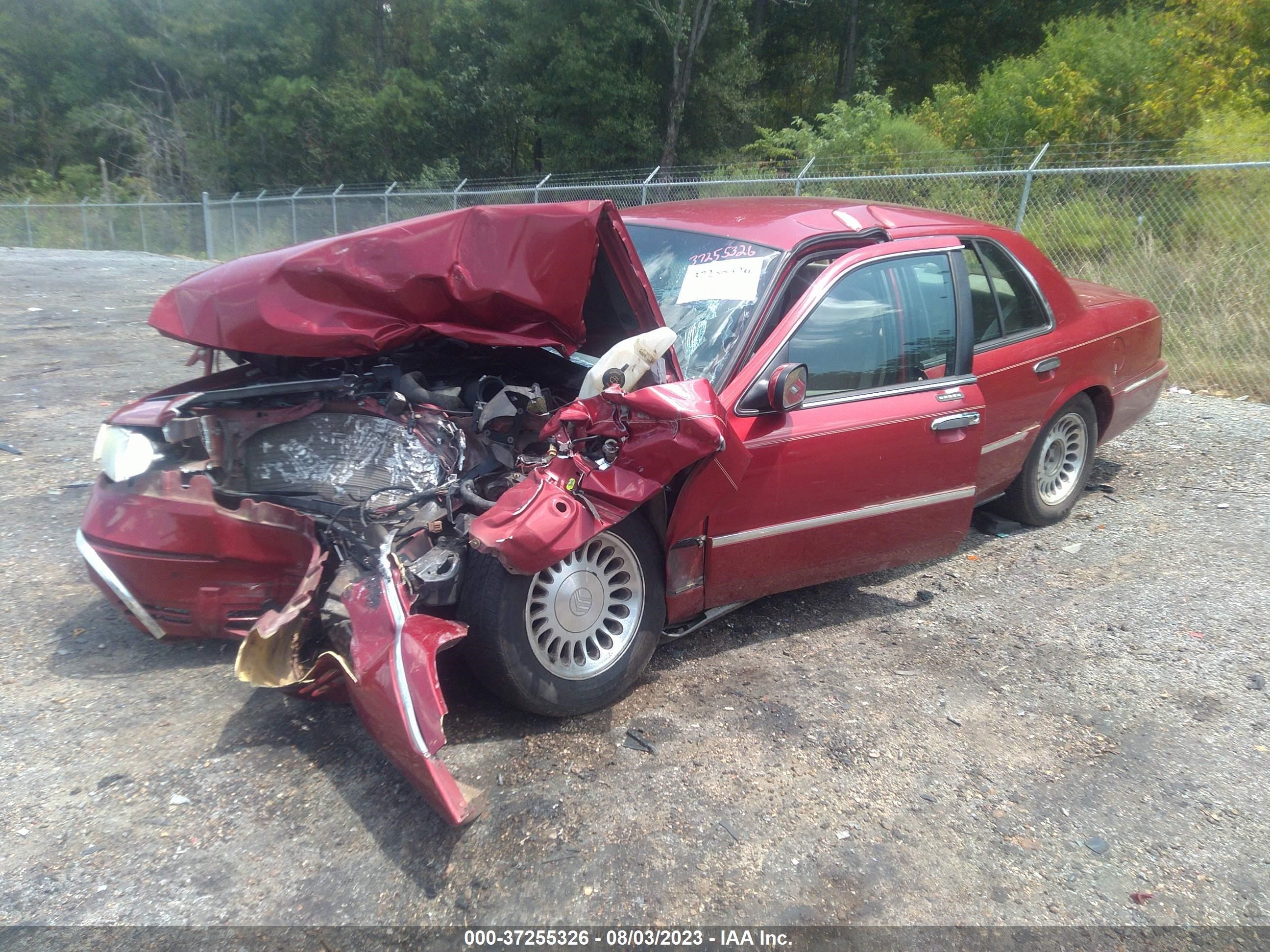 Photo 1 VIN: 2MEFM75W9YX637498 - MERCURY GRAND MARQUIS 