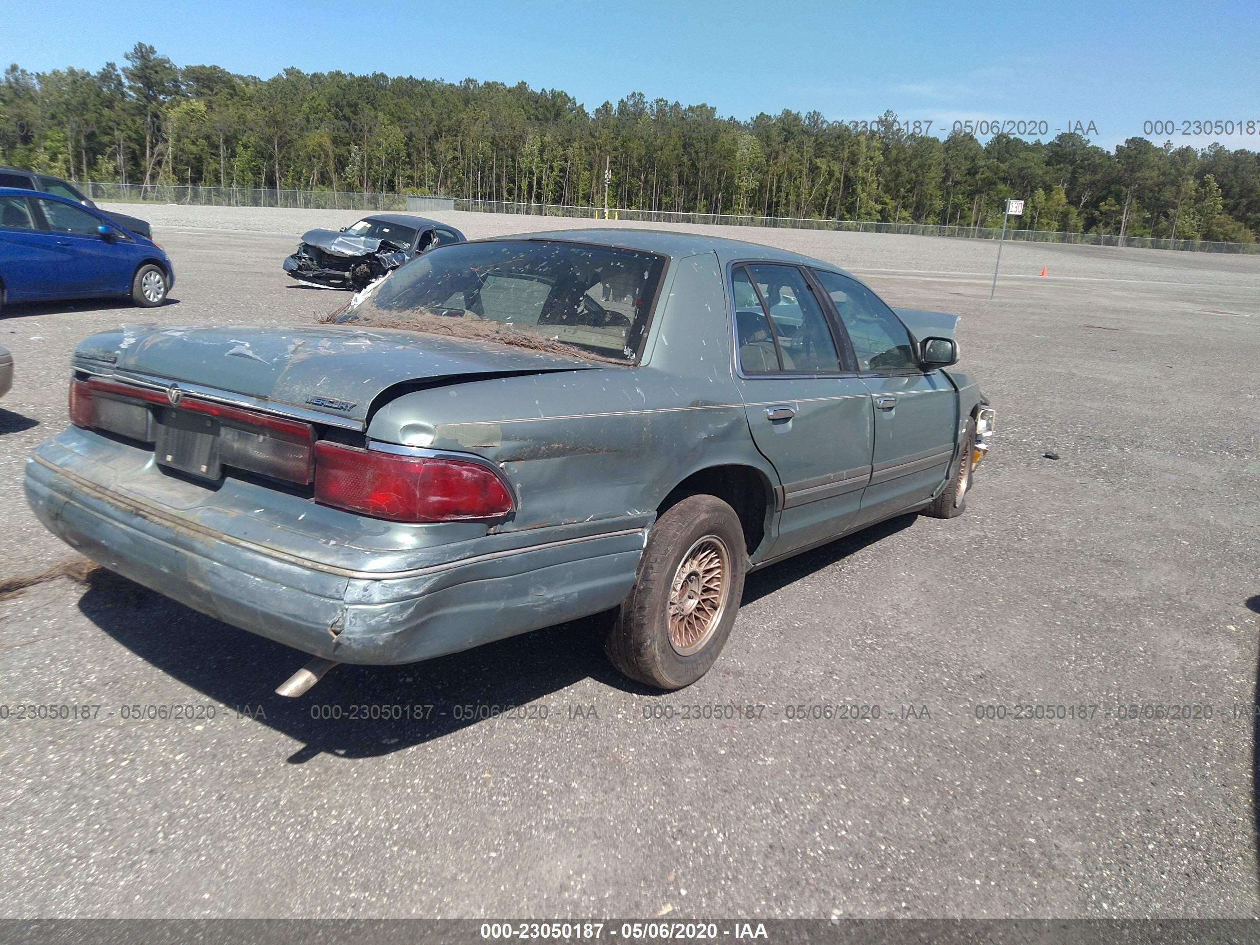 Photo 3 VIN: 2MELM75W1VX704528 - MERCURY GRAND MARQUIS 