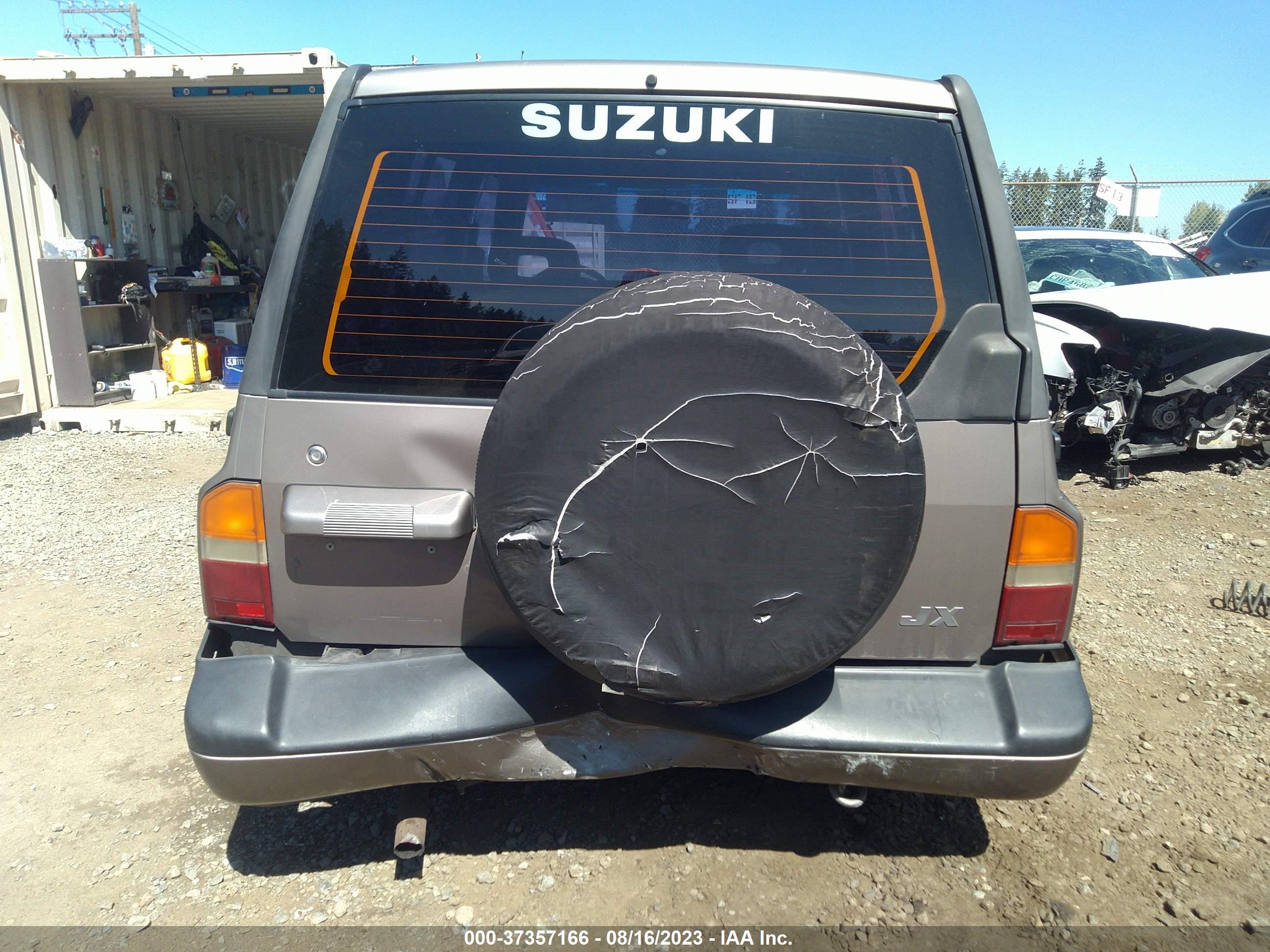 Photo 15 VIN: 2S3TD03V0T6410660 - SUZUKI SIDEKICK 