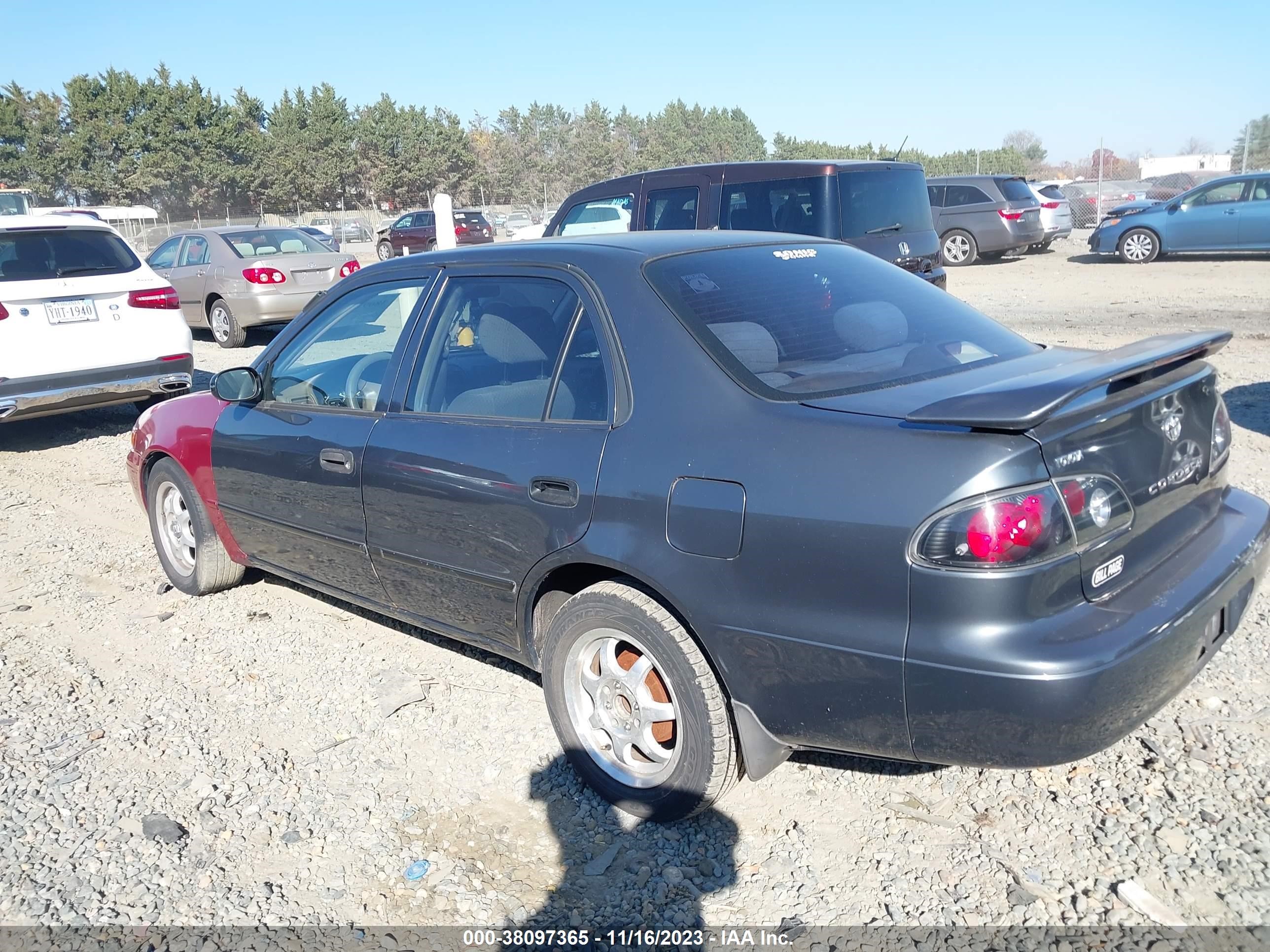 Photo 2 VIN: 2T1BR12E1XC259402 - TOYOTA COROLLA 