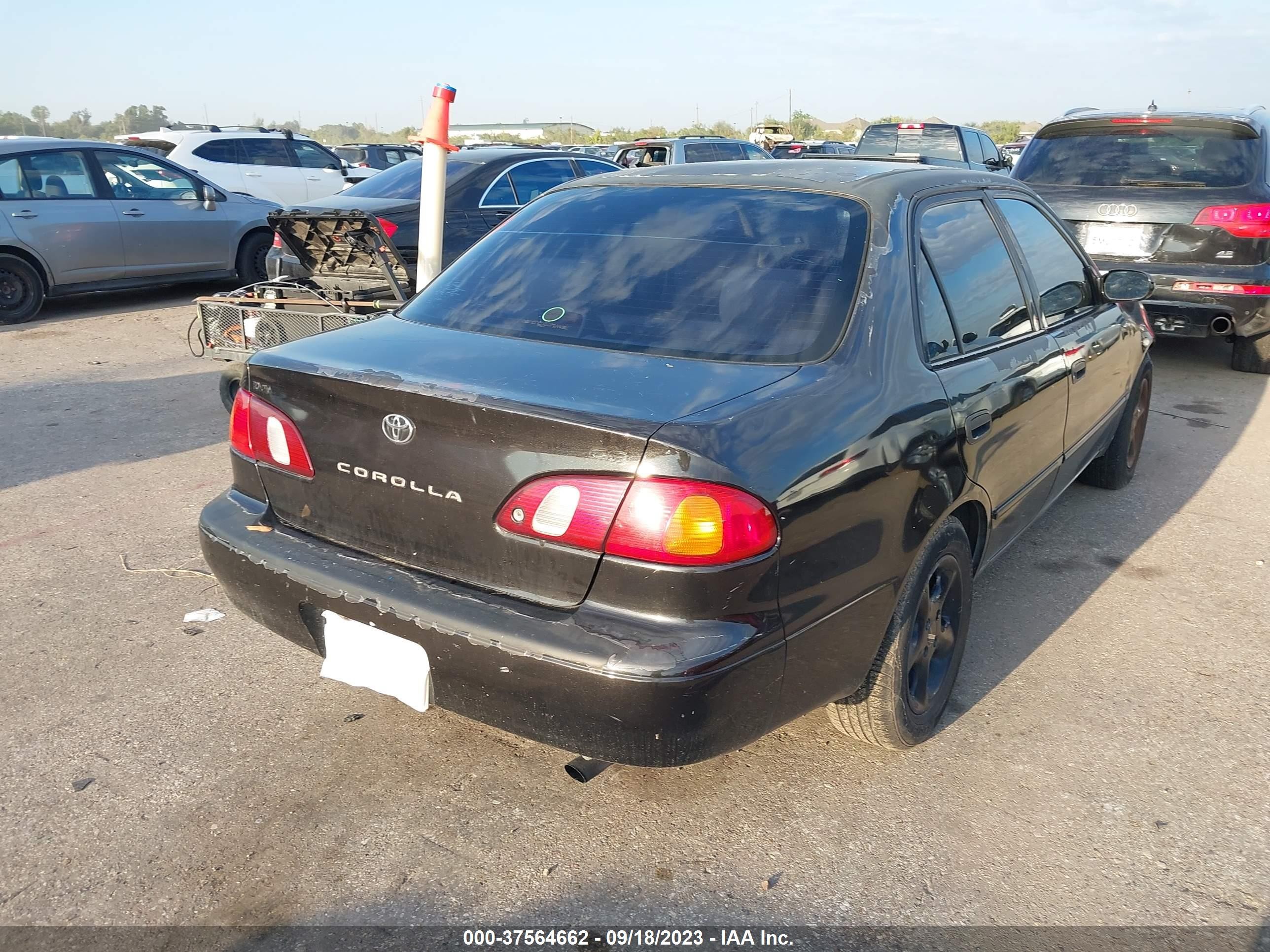 Photo 3 VIN: 2T1BR12E2XC118287 - TOYOTA COROLLA 