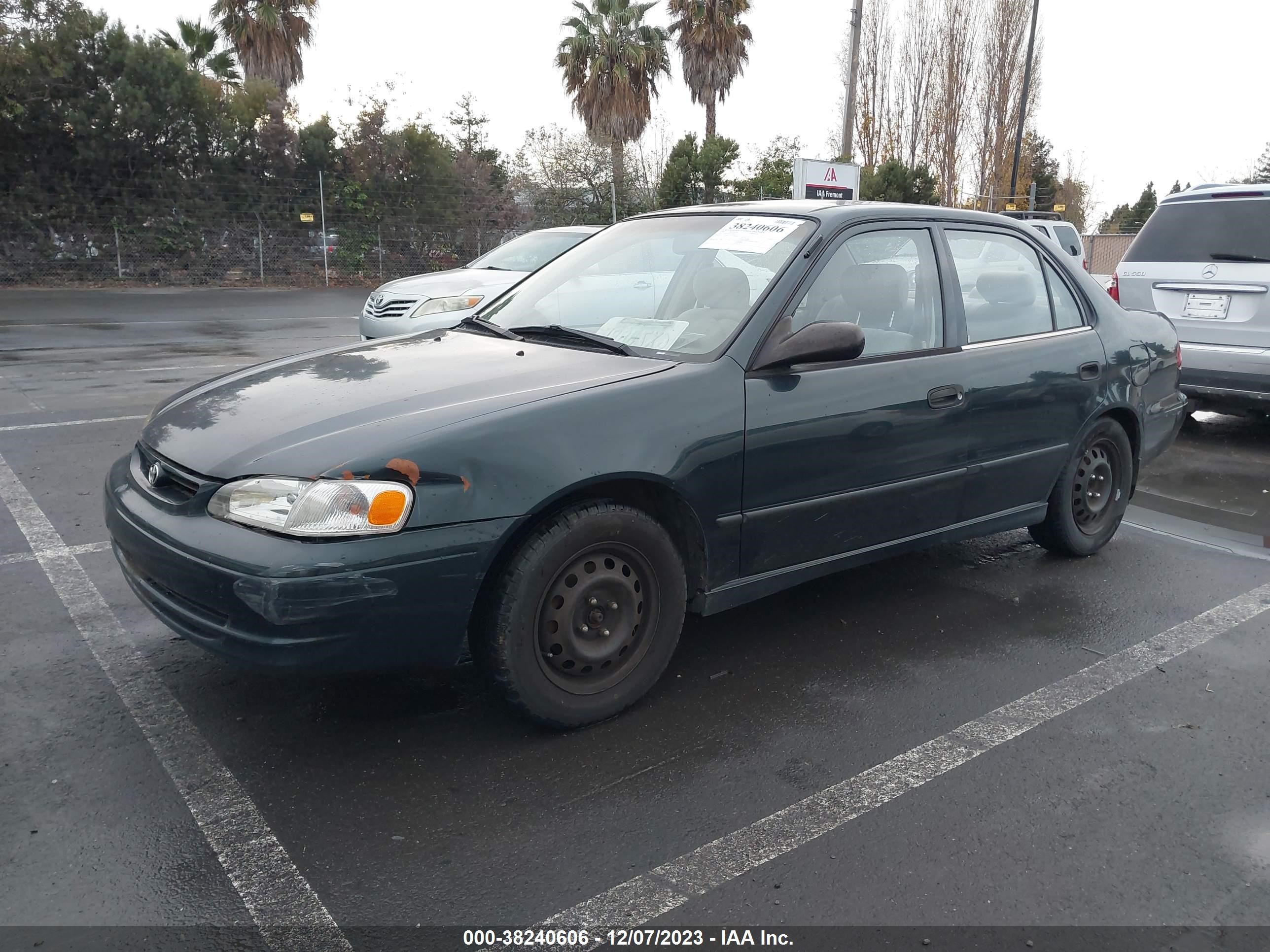 Photo 1 VIN: 2T1BR12E2XC259019 - TOYOTA COROLLA 