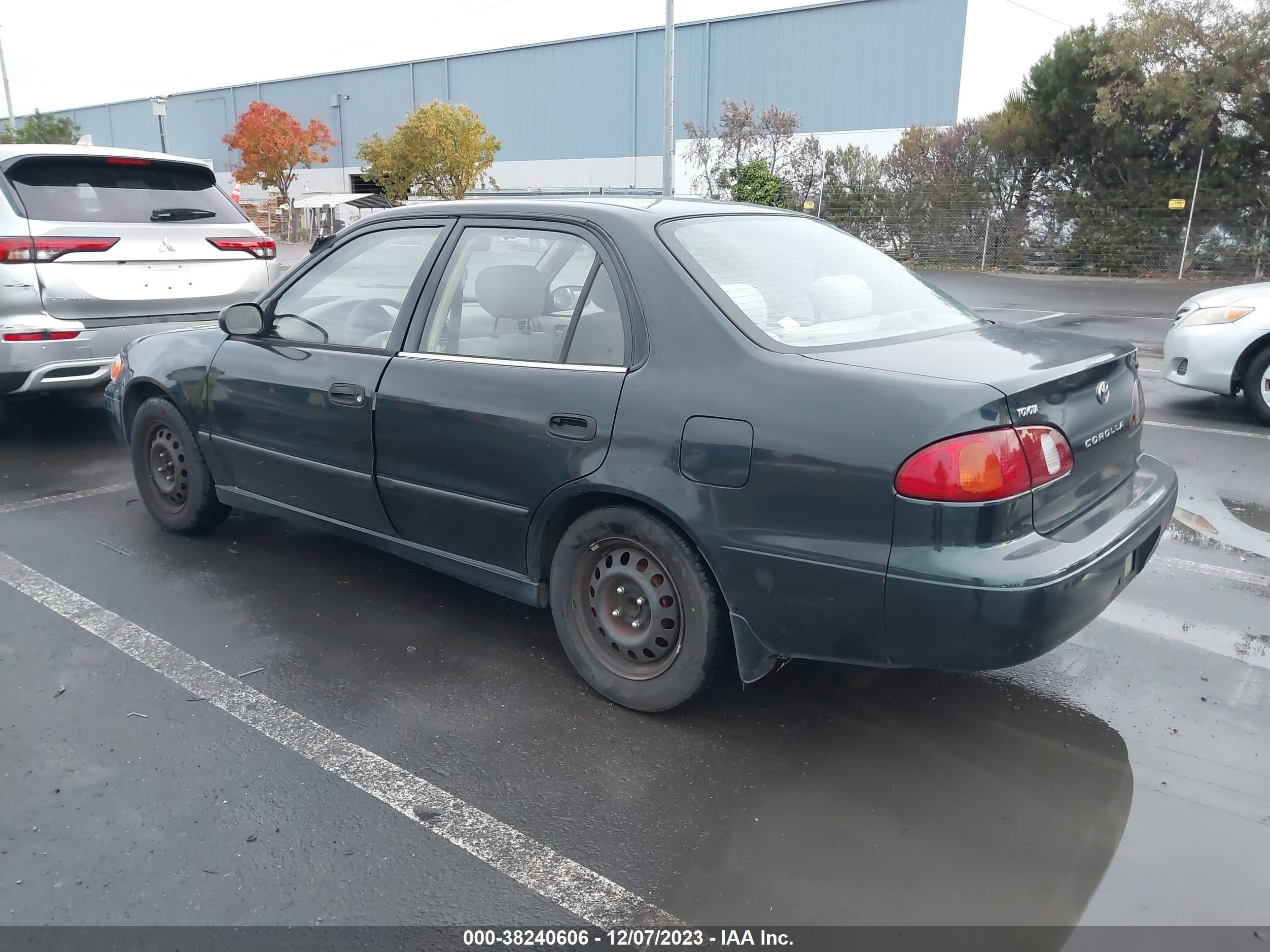 Photo 2 VIN: 2T1BR12E2XC259019 - TOYOTA COROLLA 