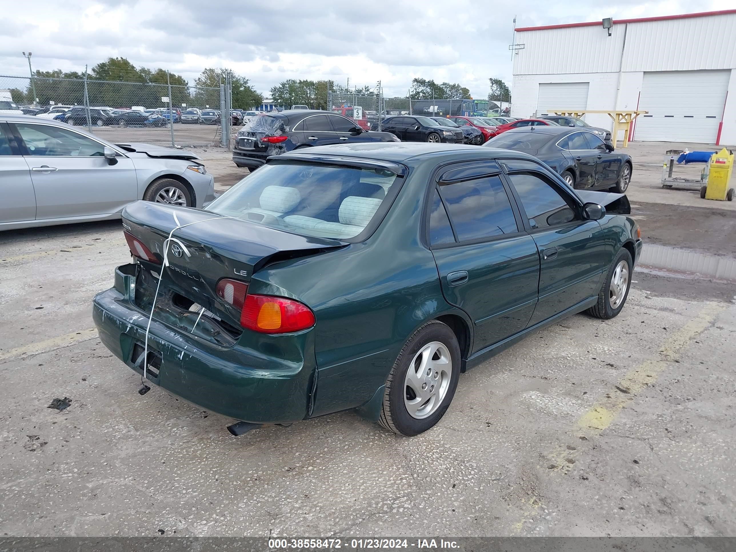 Photo 3 VIN: 2T1BR12E2YC334187 - TOYOTA COROLLA 