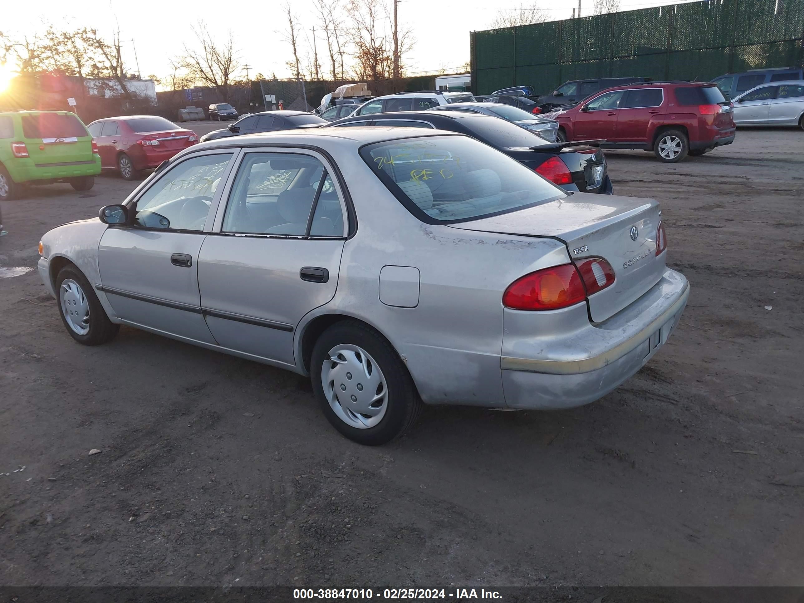 Photo 2 VIN: 2T1BR12E4XC180743 - TOYOTA COROLLA 