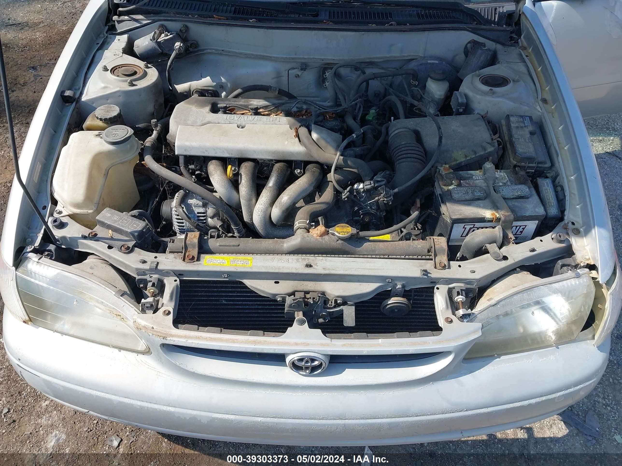 Photo 9 VIN: 2T1BR12E4XC247910 - TOYOTA COROLLA 