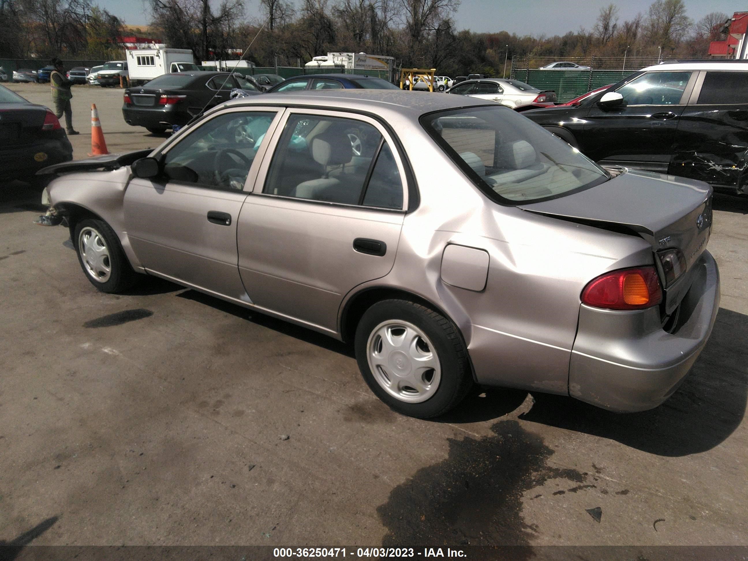 Photo 2 VIN: 2T1BR12E4XC261323 - TOYOTA COROLLA 