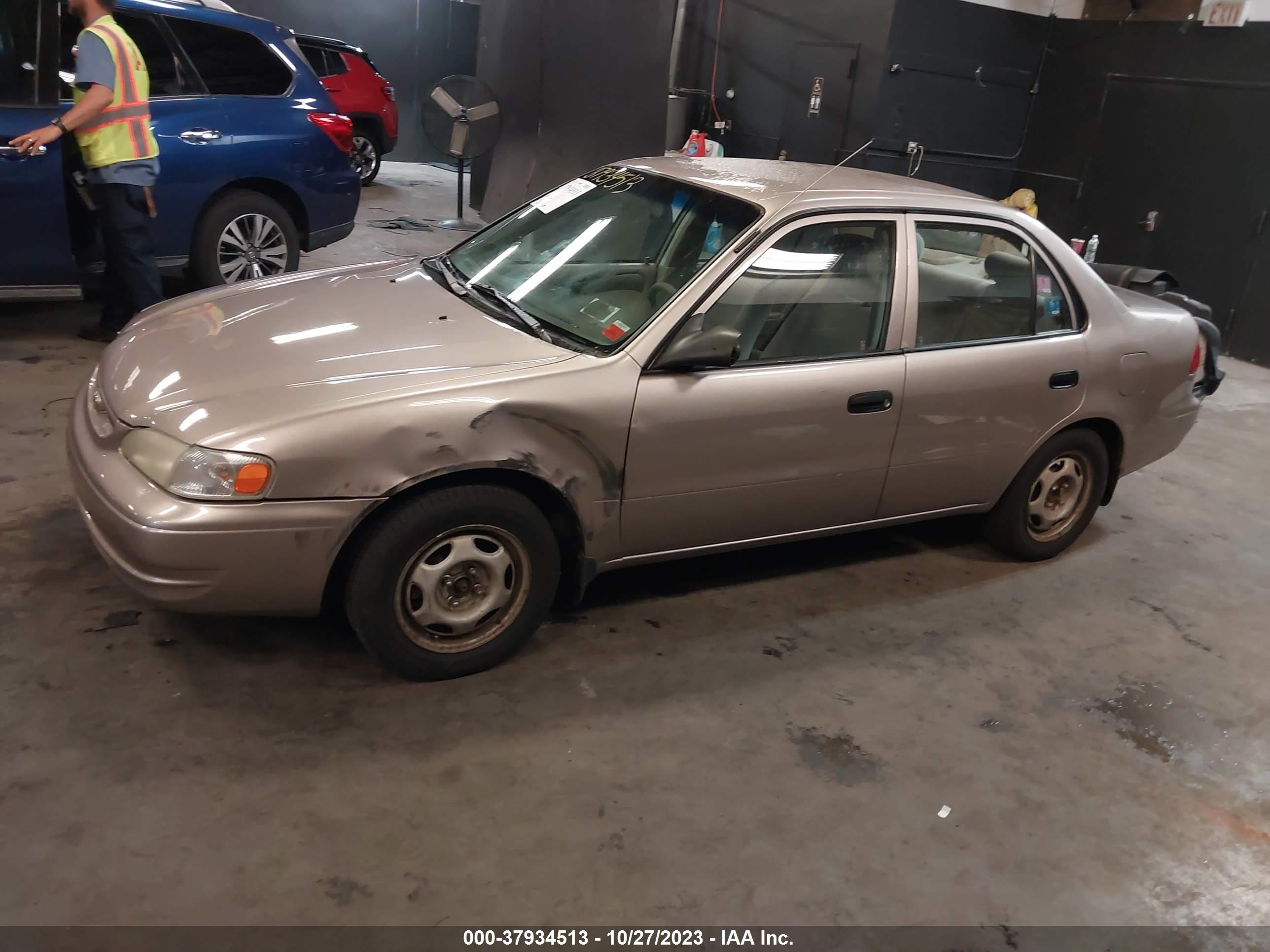 Photo 13 VIN: 2T1BR12E4YC299474 - TOYOTA COROLLA 