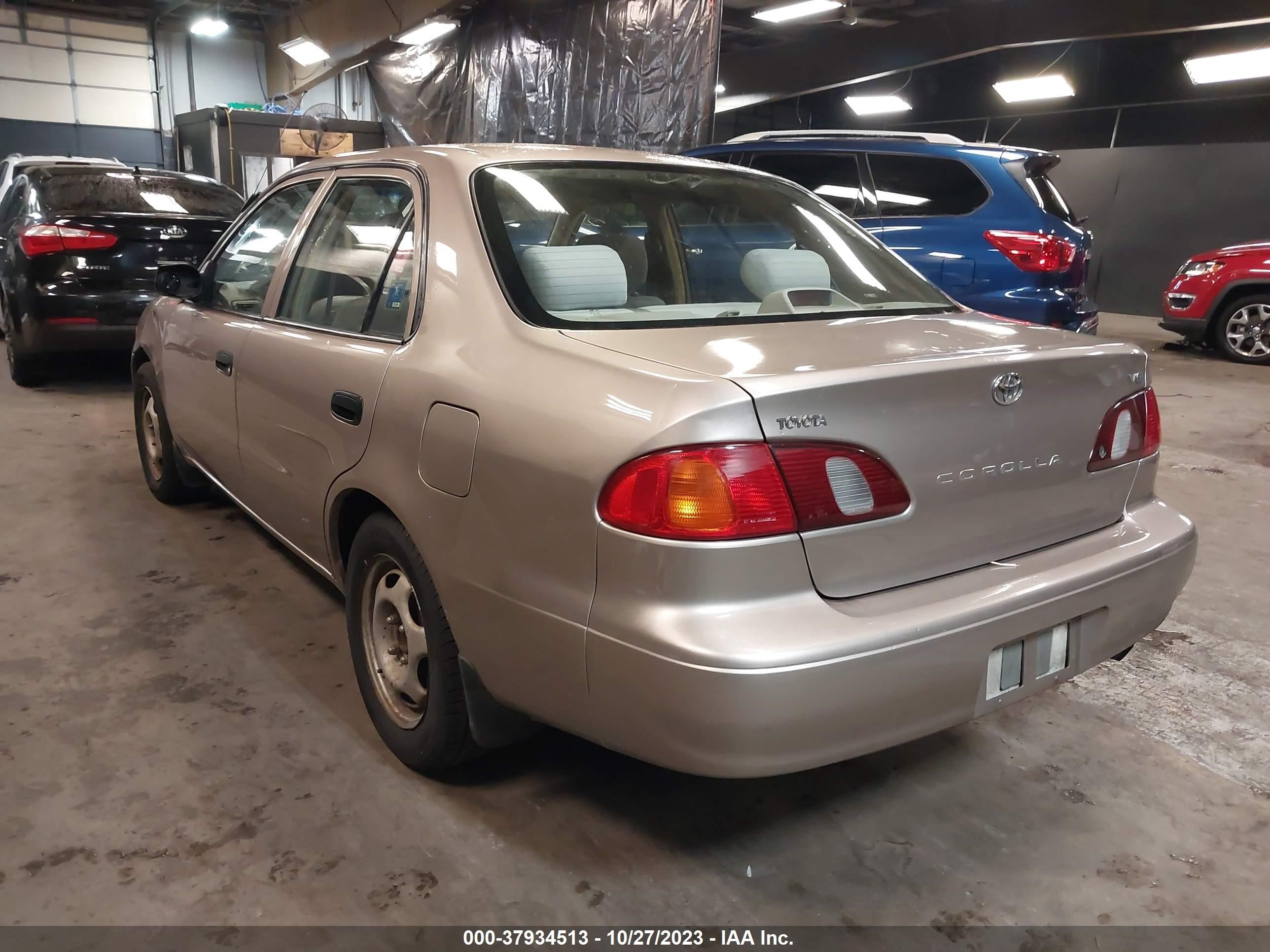 Photo 2 VIN: 2T1BR12E4YC299474 - TOYOTA COROLLA 