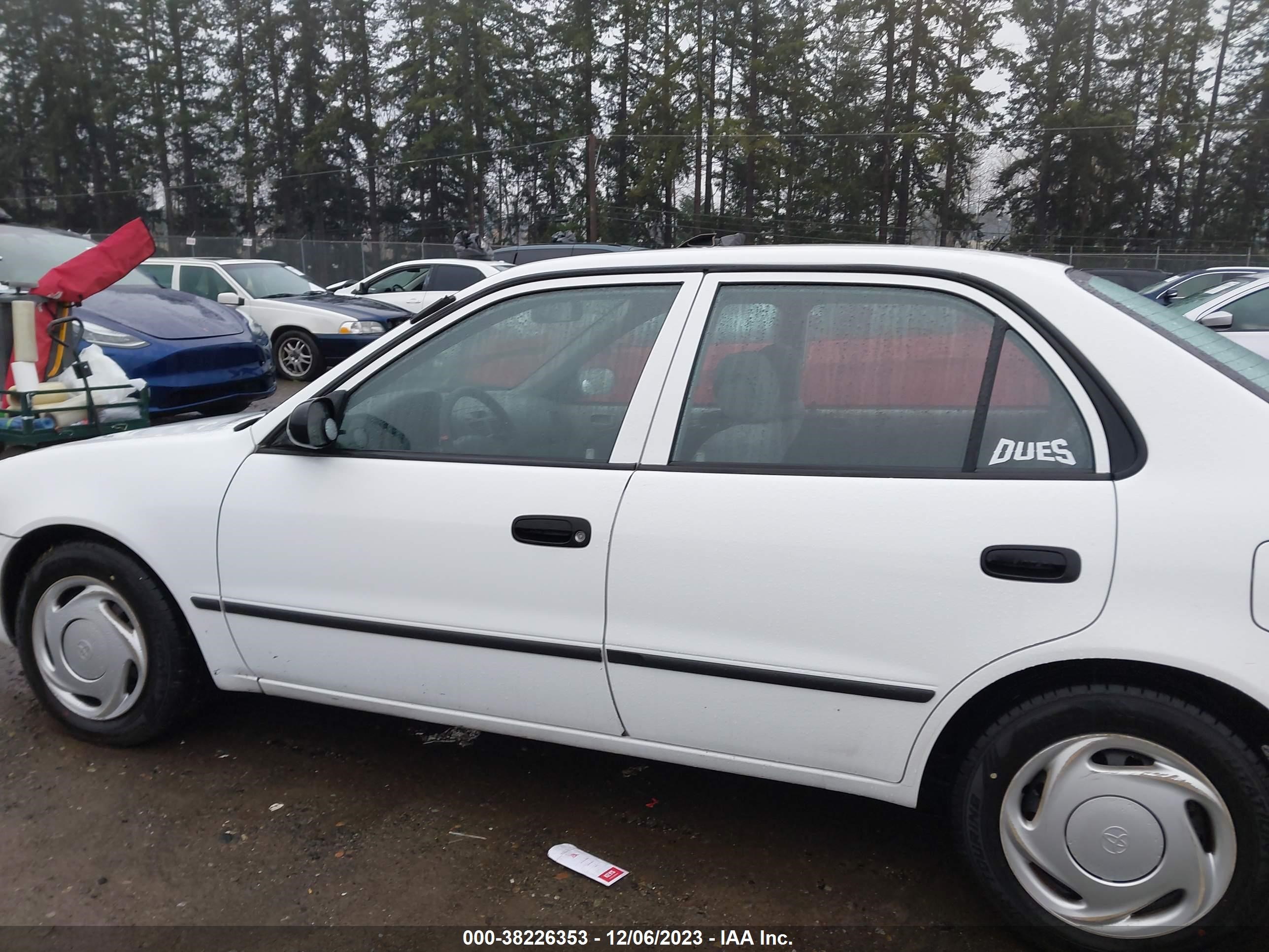 Photo 13 VIN: 2T1BR12E5YC306903 - TOYOTA COROLLA 