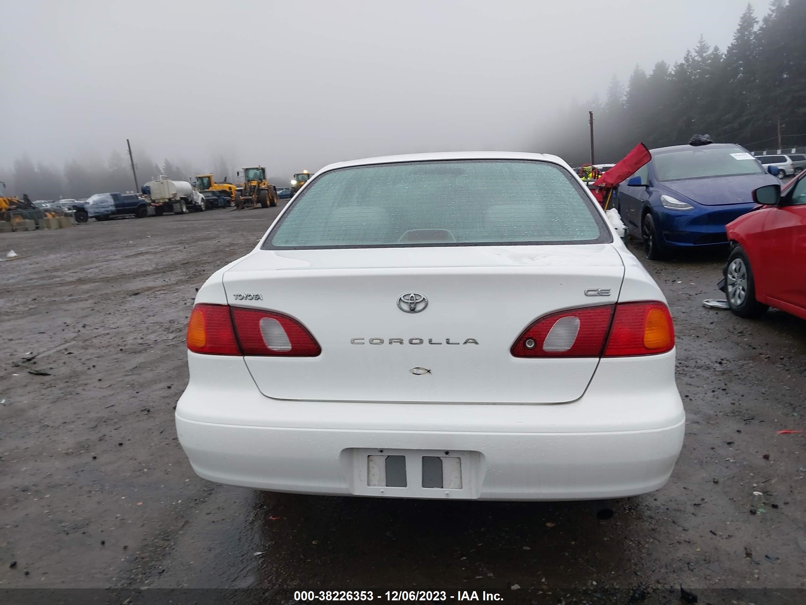 Photo 15 VIN: 2T1BR12E5YC306903 - TOYOTA COROLLA 