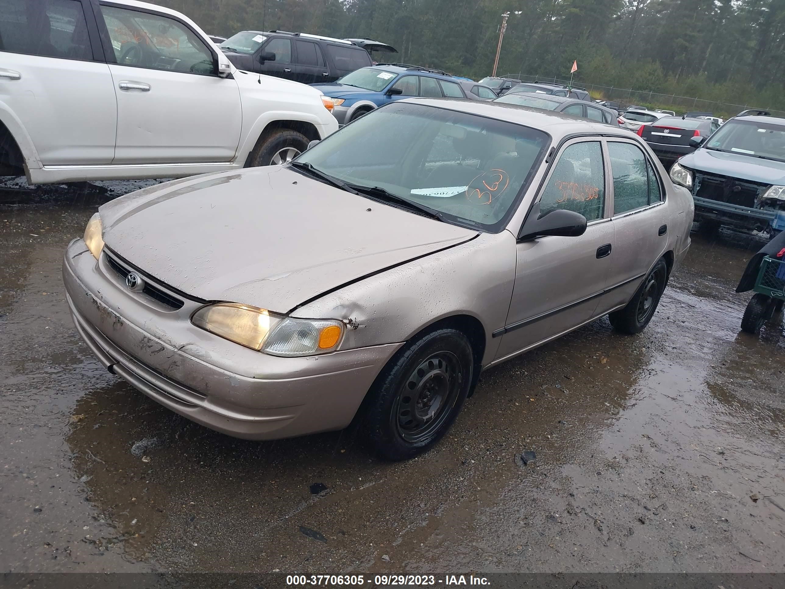 Photo 1 VIN: 2T1BR12E7YC277033 - TOYOTA COROLLA 