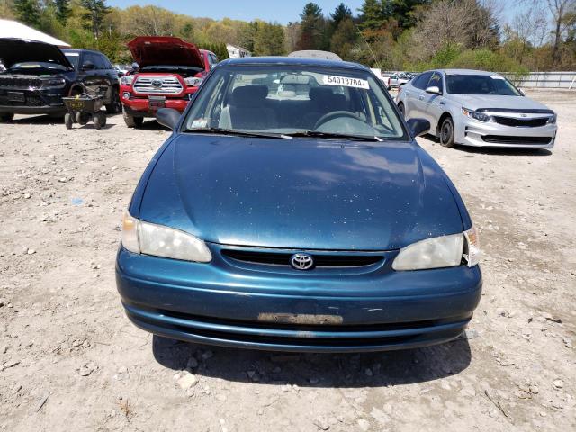 Photo 4 VIN: 2T1BR12E8YC266395 - TOYOTA COROLLA 