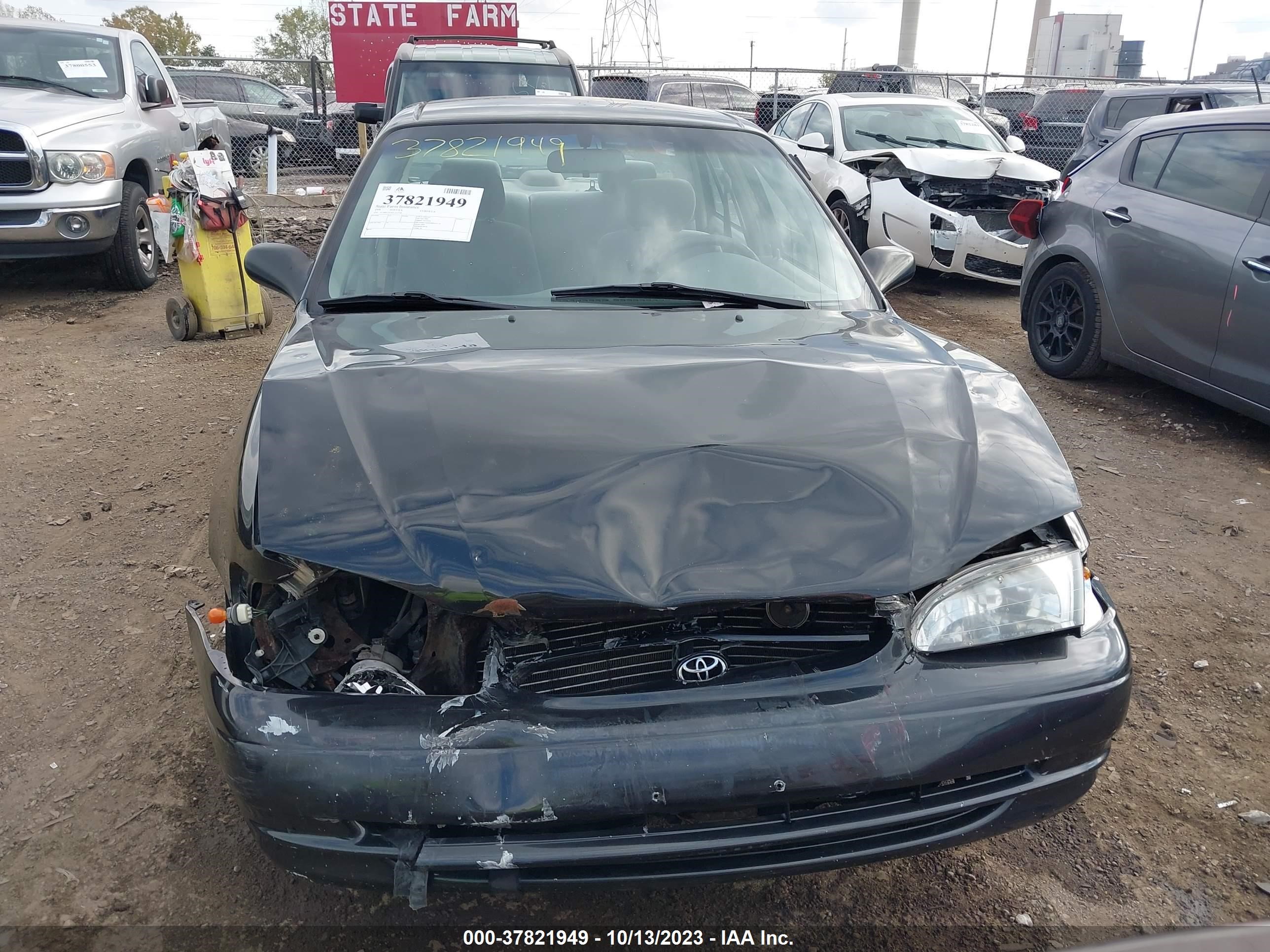 Photo 11 VIN: 2T1BR12E9XC222338 - TOYOTA COROLLA 