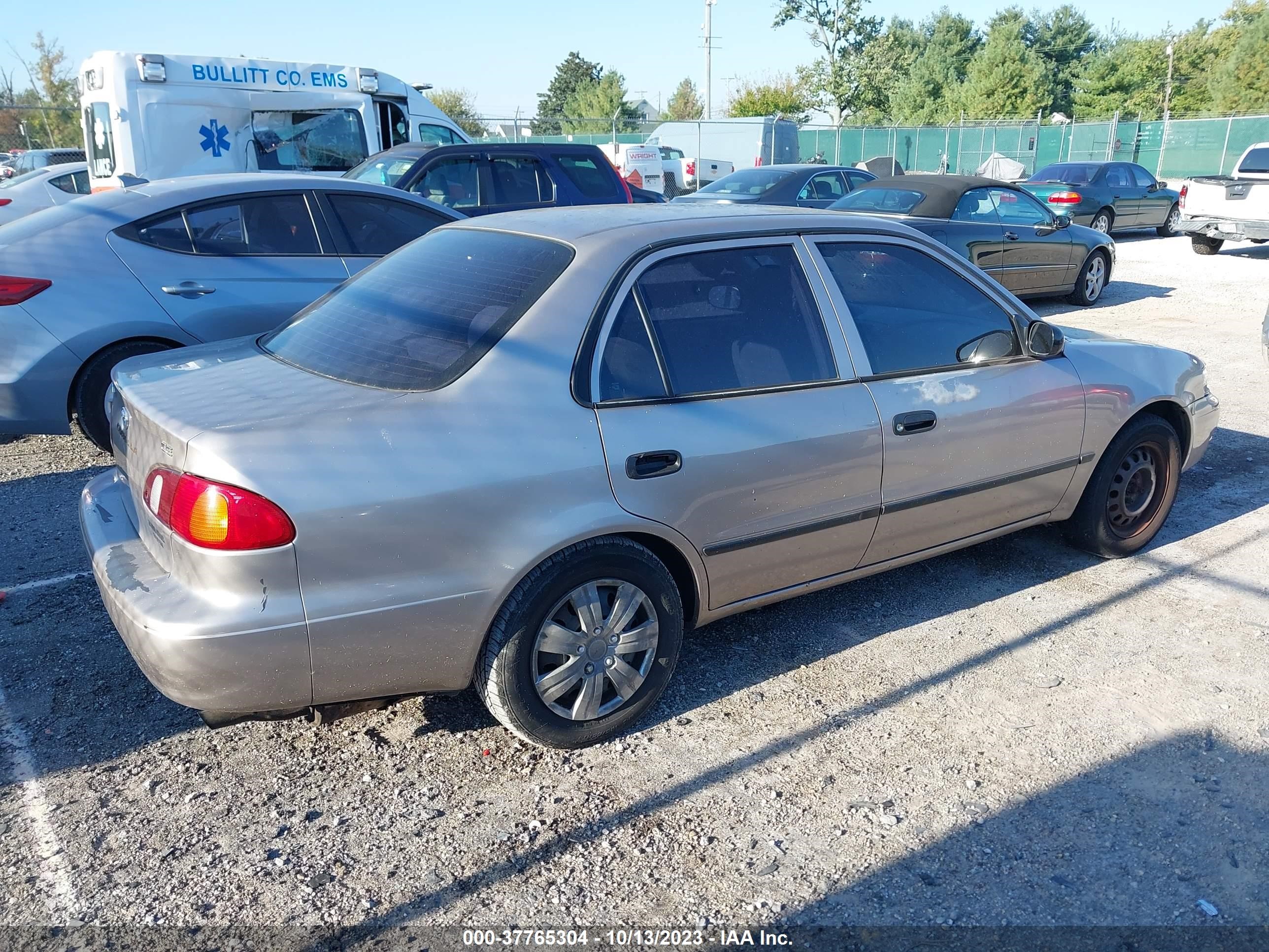 Photo 3 VIN: 2T1BR12E9YC274442 - TOYOTA COROLLA 