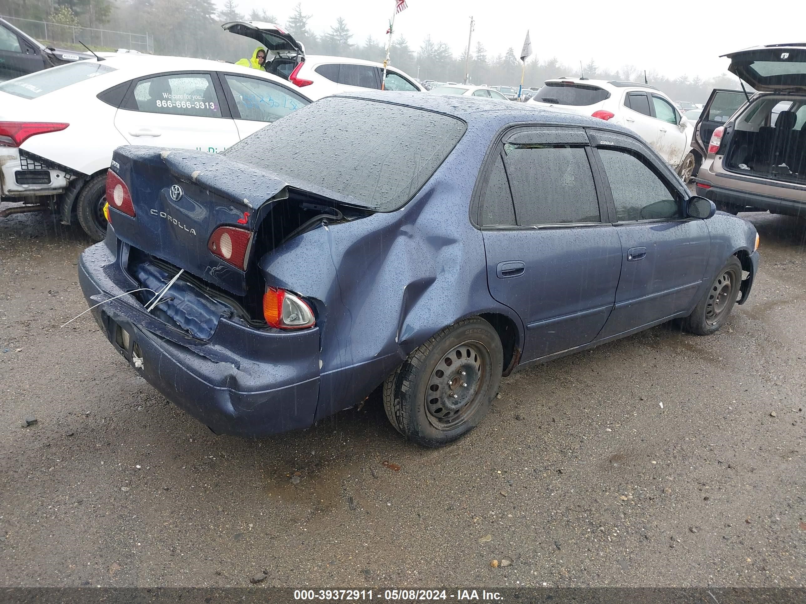 Photo 3 VIN: 2T1BR18E7YC320728 - TOYOTA COROLLA 