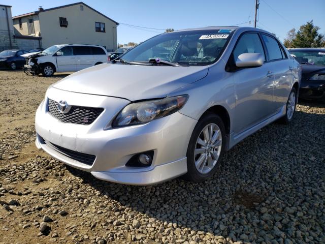 Photo 1 VIN: 2T1BU4EE0AC250385 - TOYOTA COROLLA BA 