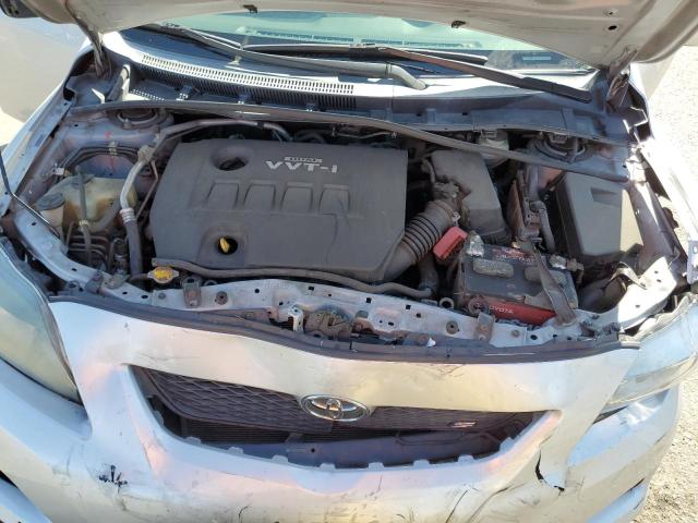 Photo 10 VIN: 2T1BU4EE3AC409819 - TOYOTA COROLLA 