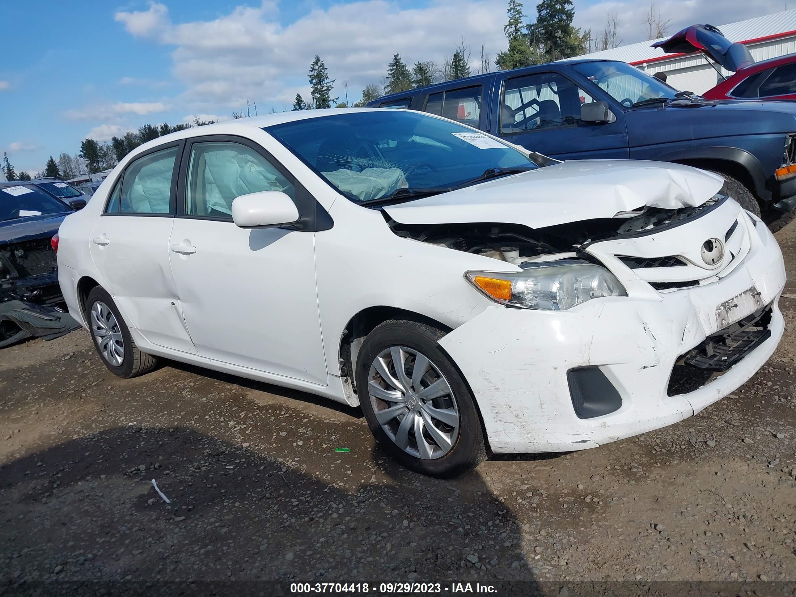 Photo 12 VIN: 2T1BU4EE3CC857724 - TOYOTA COROLLA 