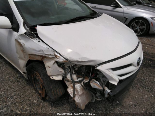 Photo 5 VIN: 2T1BU4EE8BC719319 - TOYOTA COROLLA 