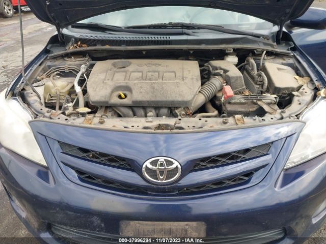 Photo 9 VIN: 2T1BU4EEXBC704563 - TOYOTA COROLLA 