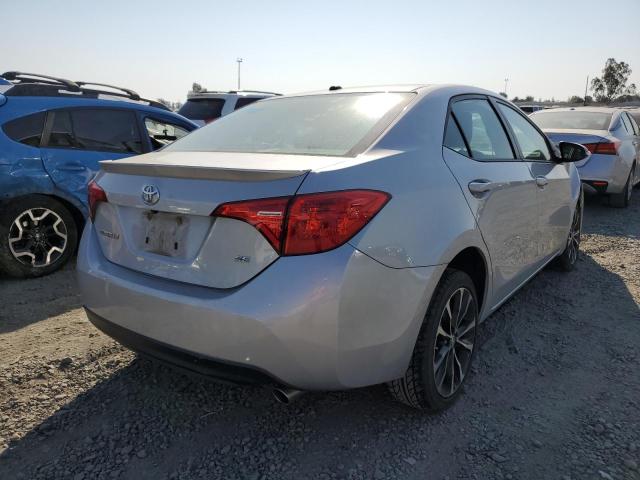 Photo 3 VIN: 2T1BURHE0HC798986 - TOYOTA COROLLA L 