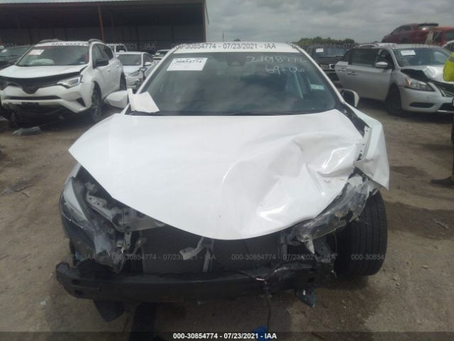 Photo 5 VIN: 2T1BURHE0JC045576 - TOYOTA COROLLA 