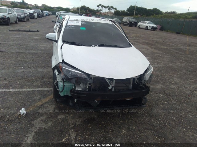 Photo 5 VIN: 2T1BURHE0JC058361 - TOYOTA COROLLA 