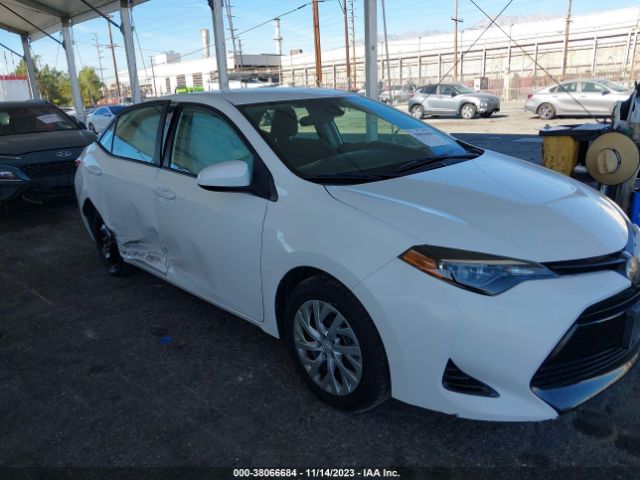 Photo 5 VIN: 2T1BURHE0JC082823 - TOYOTA COROLLA 