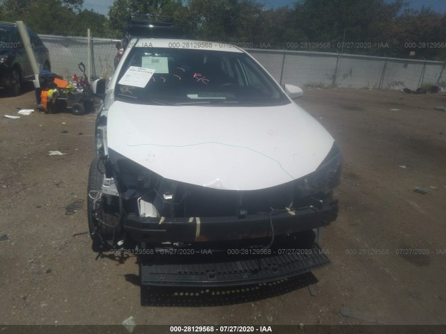 Photo 5 VIN: 2T1BURHE0JC970469 - TOYOTA COROLLA 