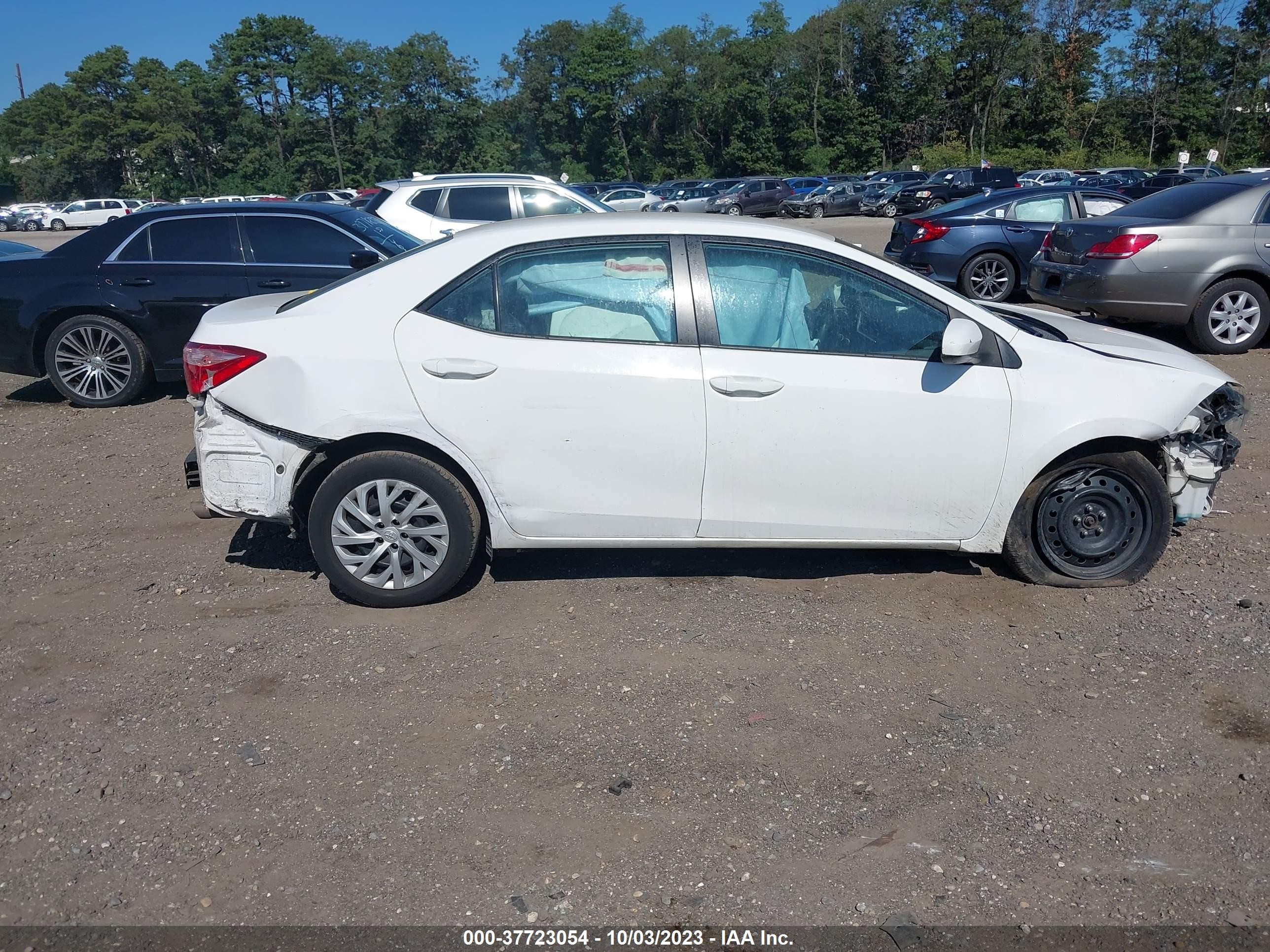 Photo 12 VIN: 2T1BURHE0JC988776 - TOYOTA COROLLA 