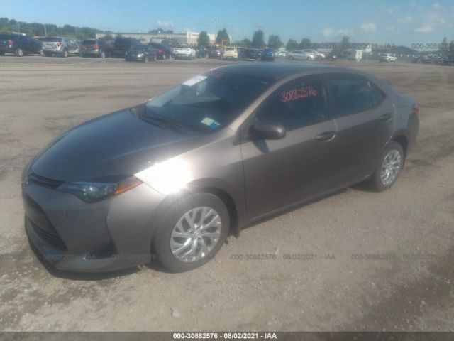 Photo 1 VIN: 2T1BURHE0JC991855 - TOYOTA COROLLA 