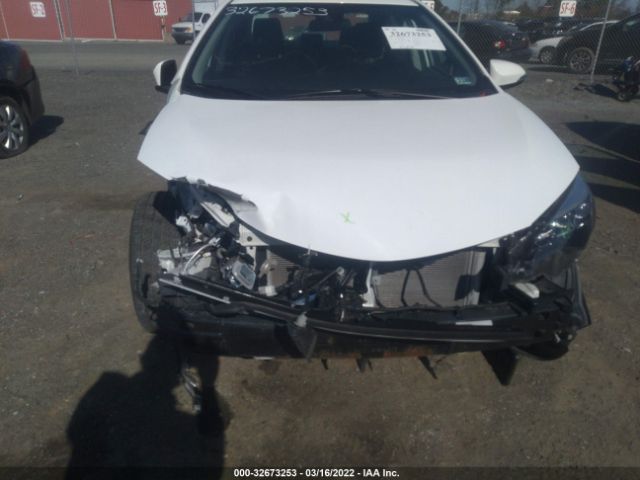 Photo 5 VIN: 2T1BURHE0KC163662 - TOYOTA COROLLA 