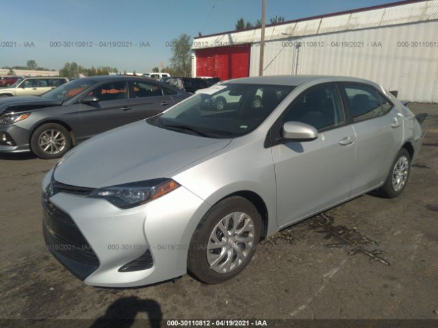 Photo 1 VIN: 2T1BURHE0KC230860 - TOYOTA COROLLA 