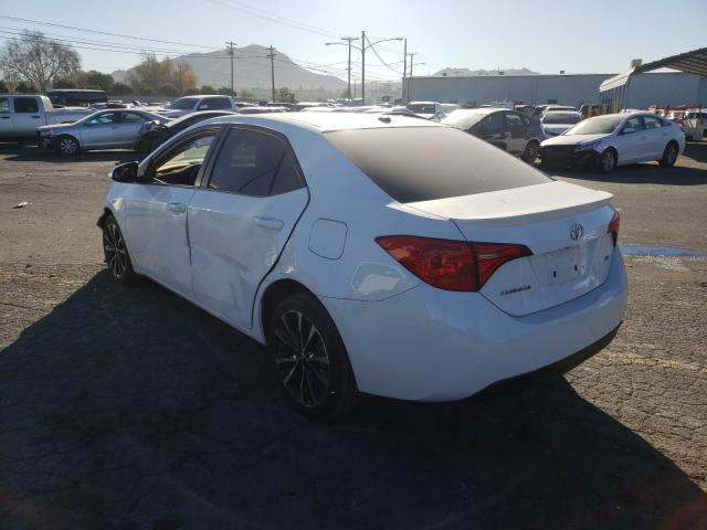 Photo 2 VIN: 2T1BURHE0KC233676 - TOYOTA COROLLA L 