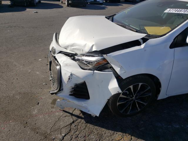 Photo 8 VIN: 2T1BURHE0KC233676 - TOYOTA COROLLA L 