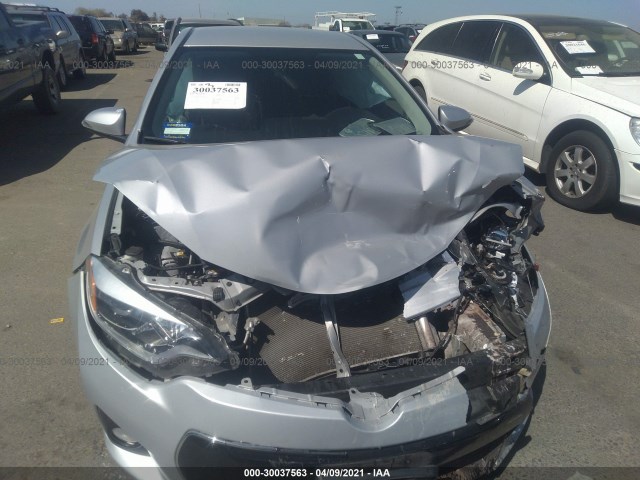 Photo 5 VIN: 2T1BURHE1EC092928 - TOYOTA COROLLA 