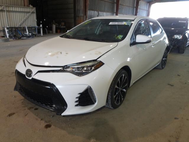 Photo 1 VIN: 2T1BURHE1HC748159 - TOYOTA COROLLA L 