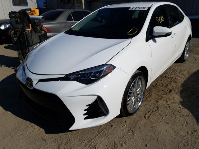 Photo 1 VIN: 2T1BURHE1JC018953 - TOYOTA COROLLA L 